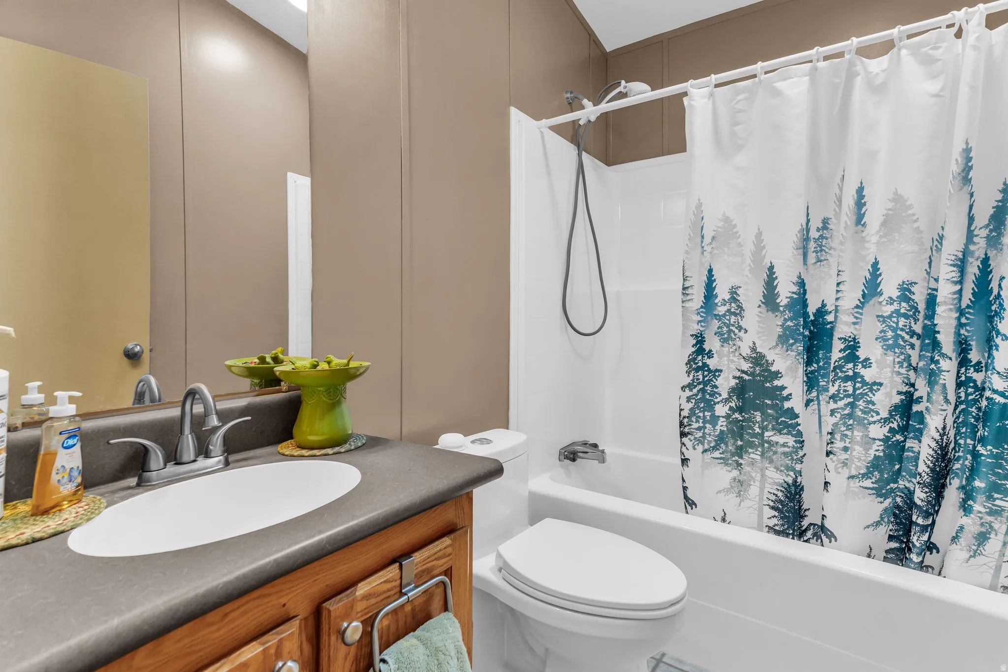 Full bathroom featuring vanity and shower / bath combo