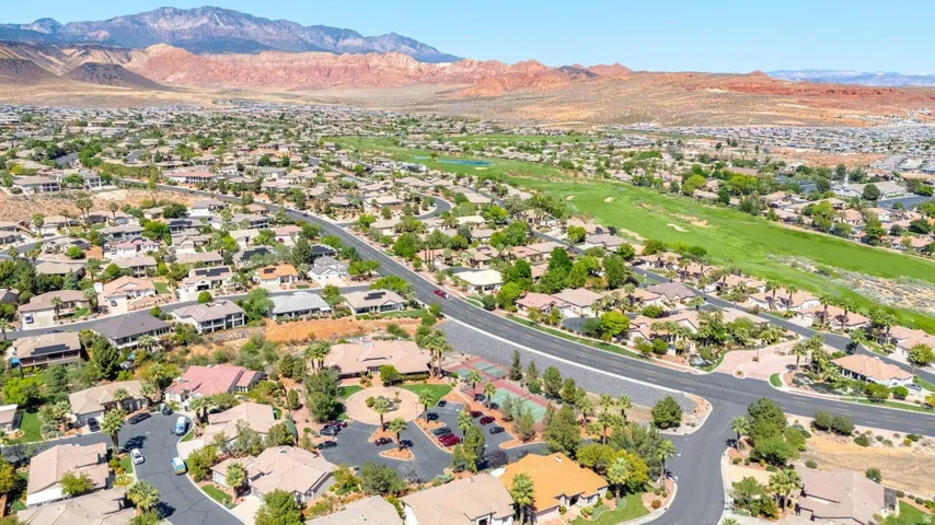 Aerial view of residential area featuring mountains