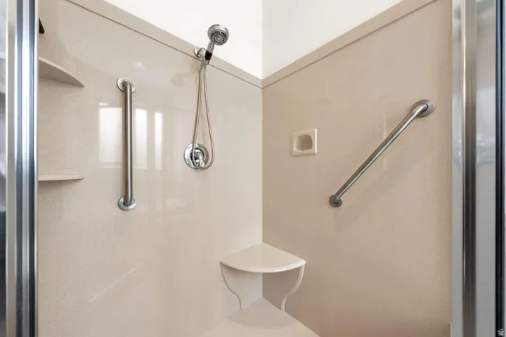 Full bathroom featuring a stall shower