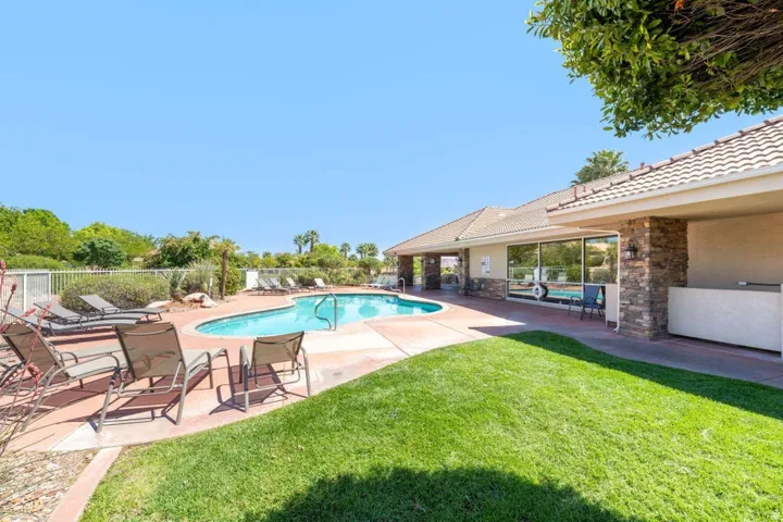 Community pool featuring a patio area