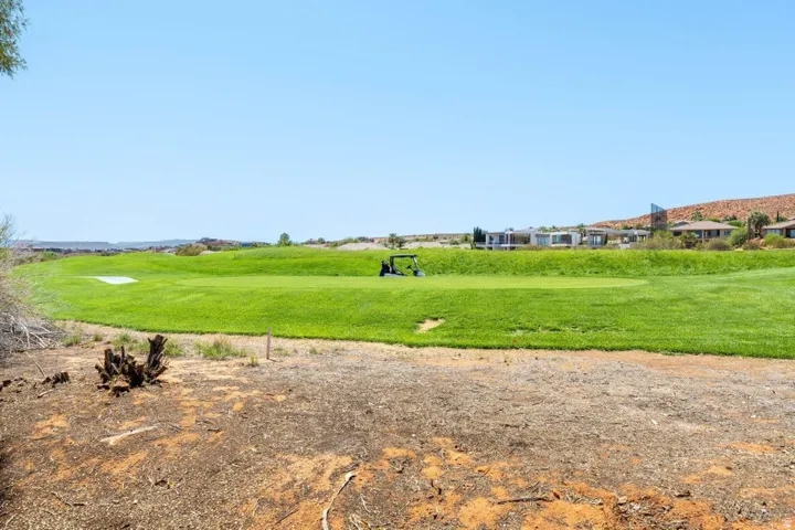 Surrounding community with golf course view