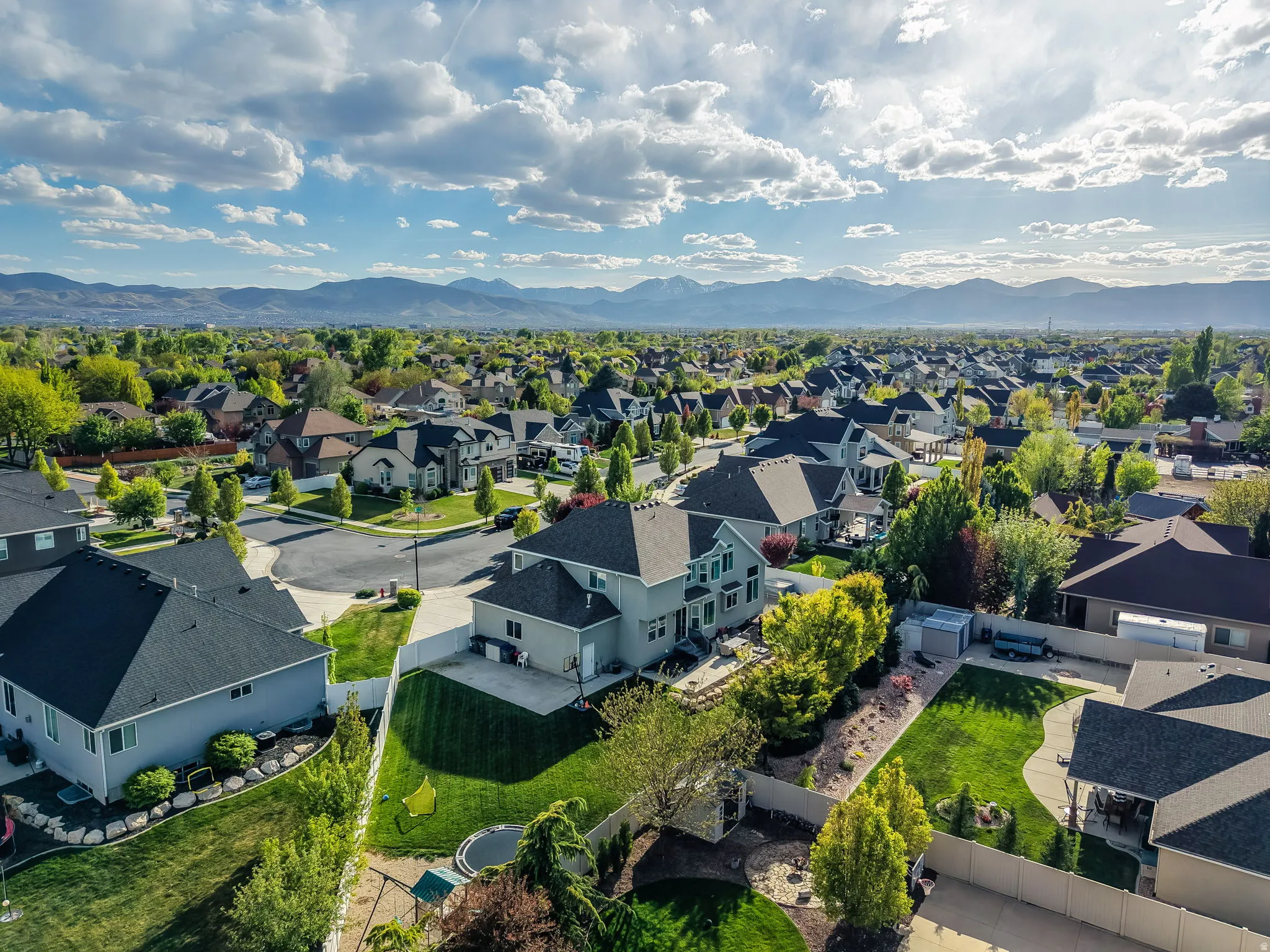 Aerial view of residential area with a mountain backdrop