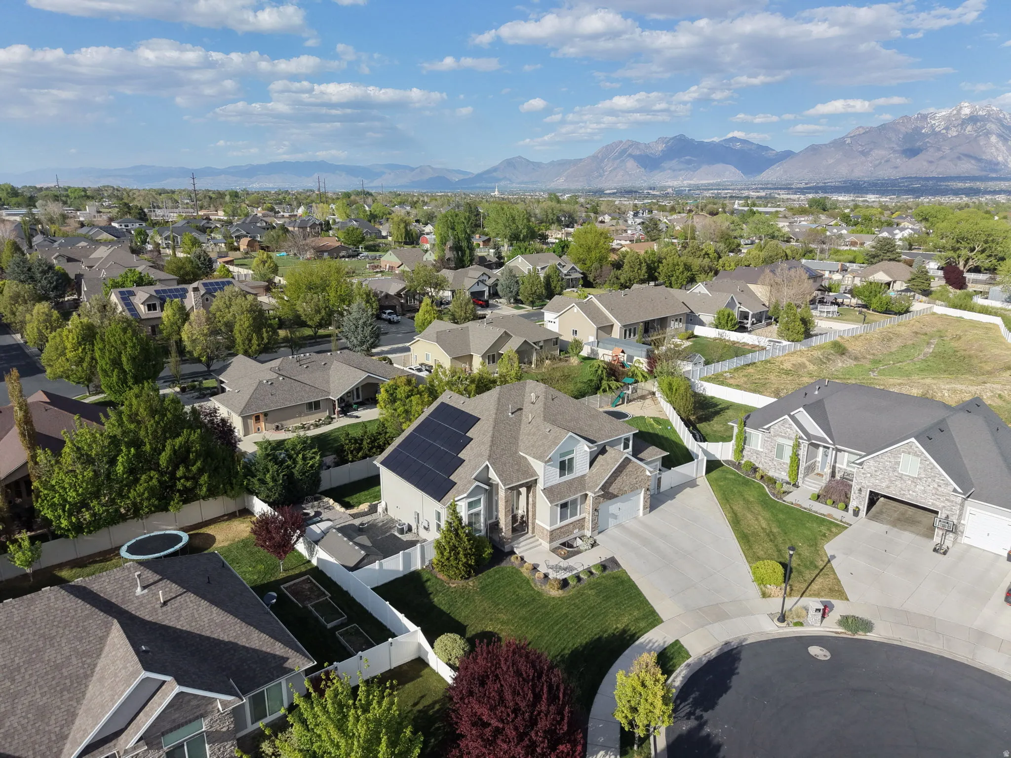 Aerial perspective of suburban area with mountains