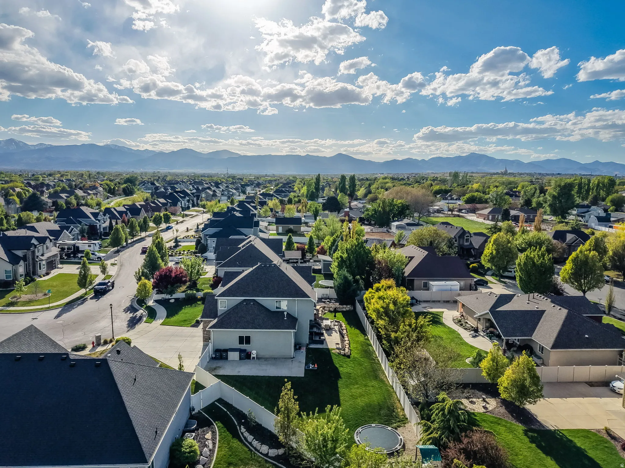 Aerial view of residential area with mountains