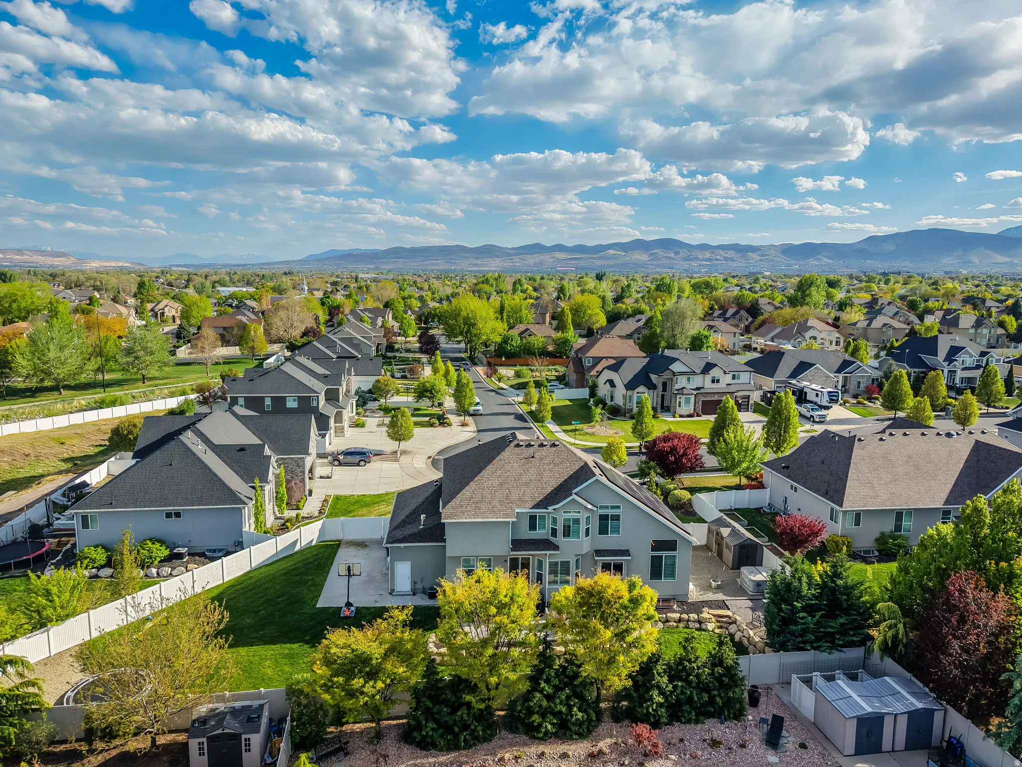 Aerial perspective of suburban area with mountains