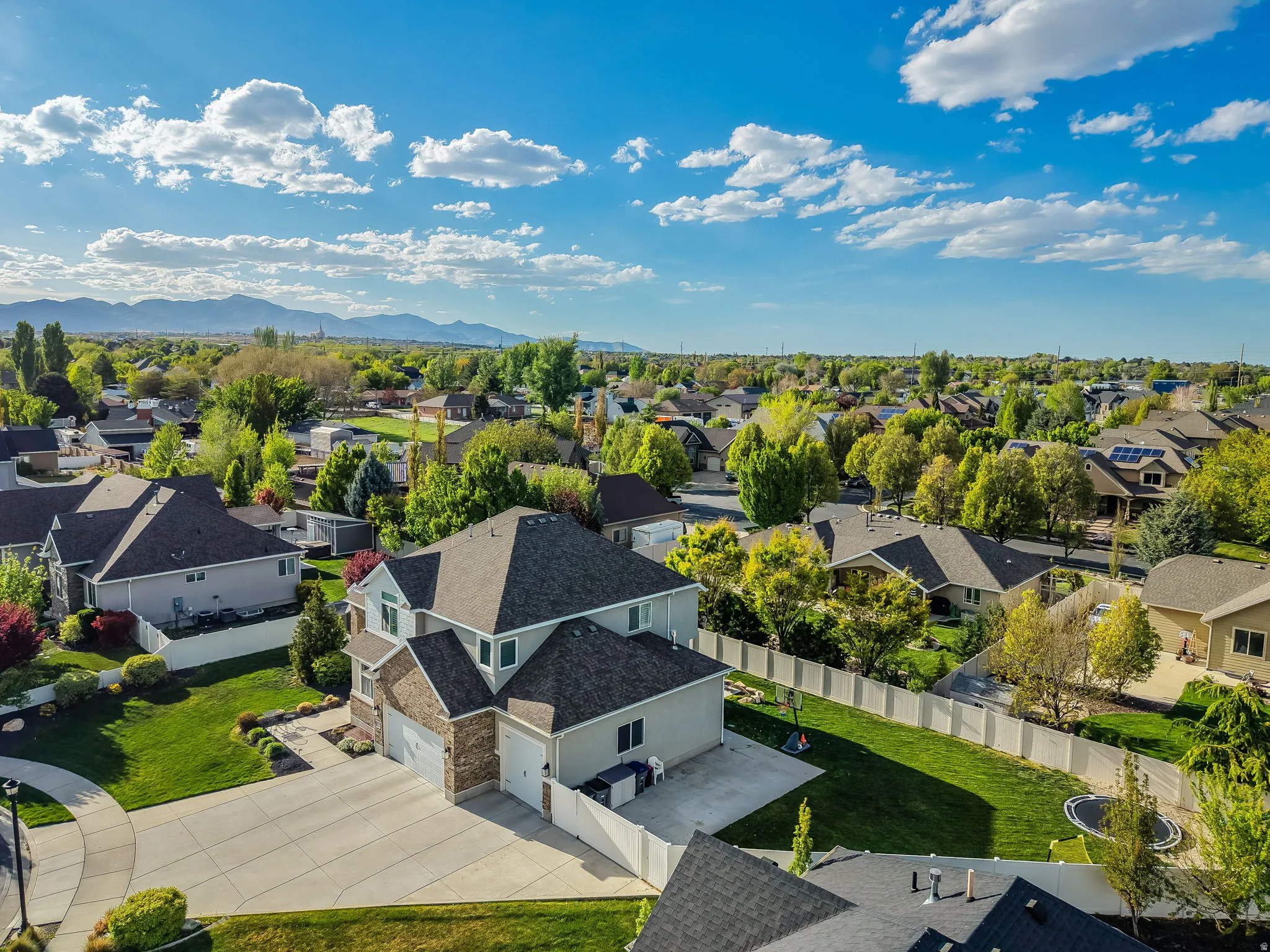Aerial view of residential area with a mountain backdrop