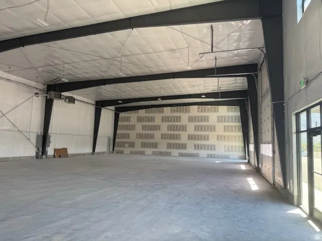 Garage featuring a heating unit