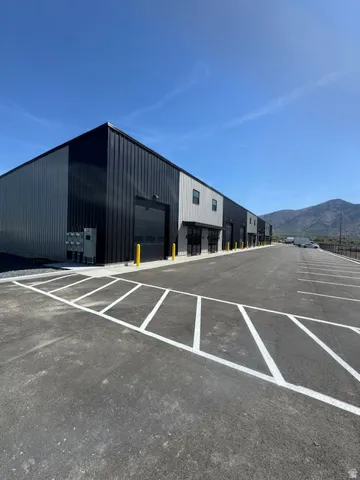 View of parking featuring a mountain view