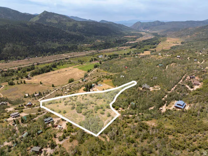 Aerial view of sparsely populated area with mountains