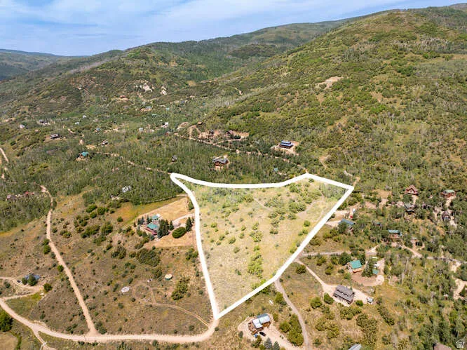 View of property location with mountains and rural landscape