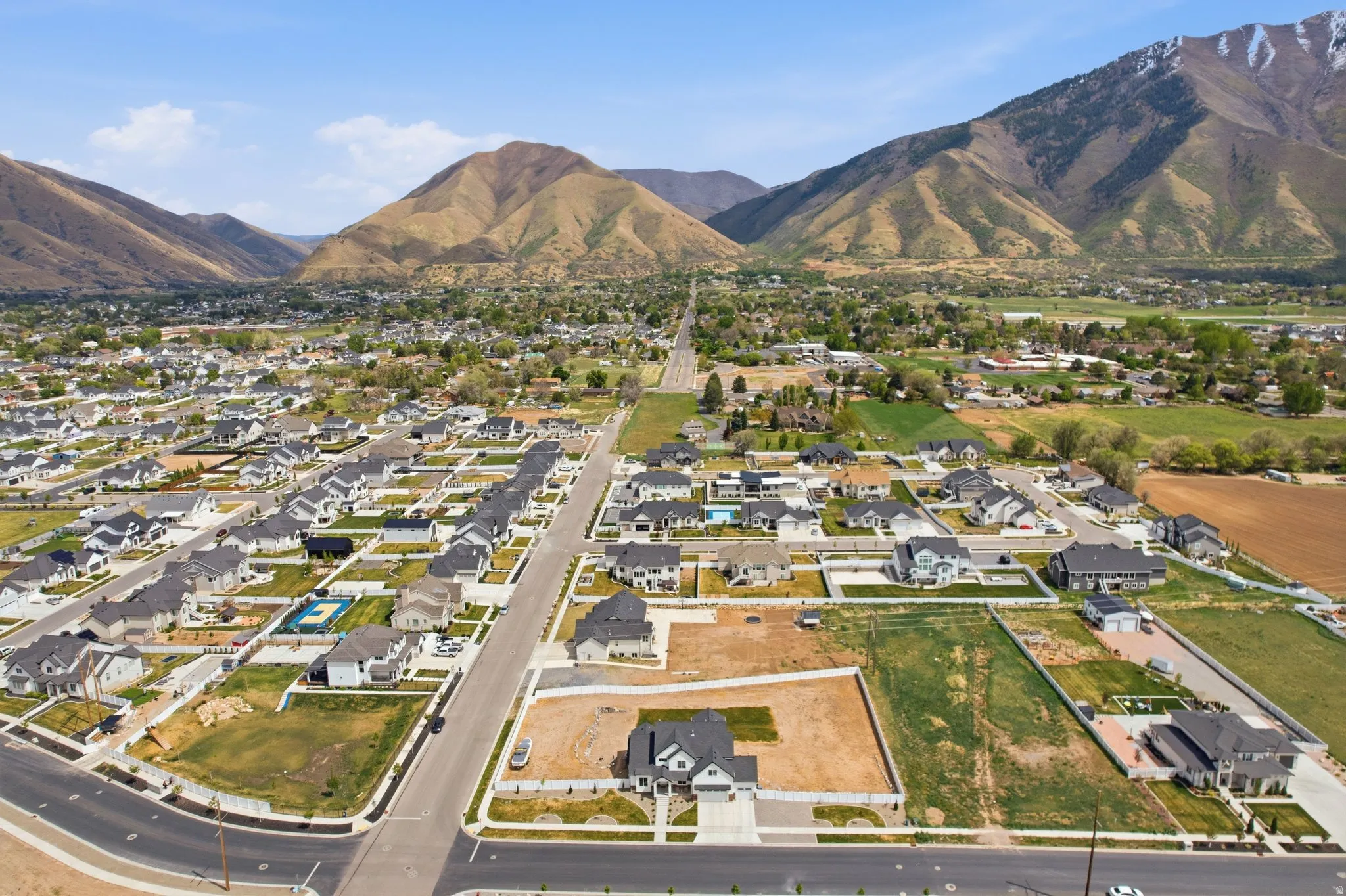 Aerial perspective of suburban area with mountains