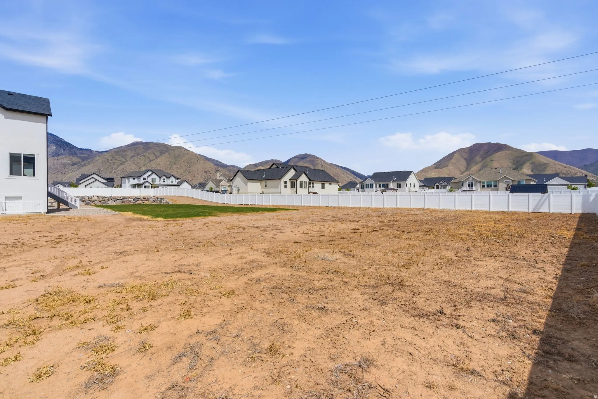 View of yard with a mountain view and a residential view