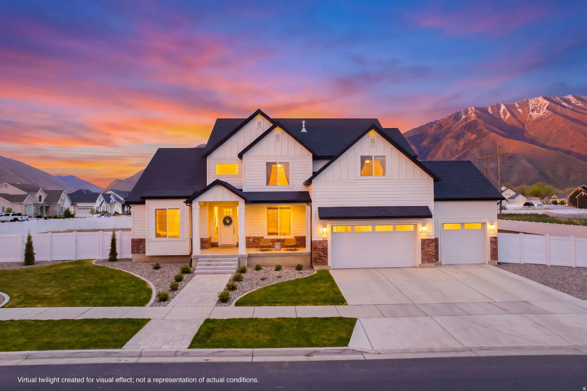 Modern farmhouse featuring a porch, board and batten siding, driveway, a shingled roof, and a mountain view