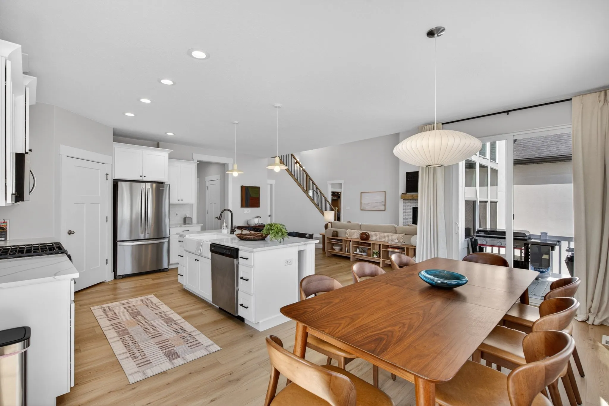 Dining room featuring light wood finished floors and recessed lighting