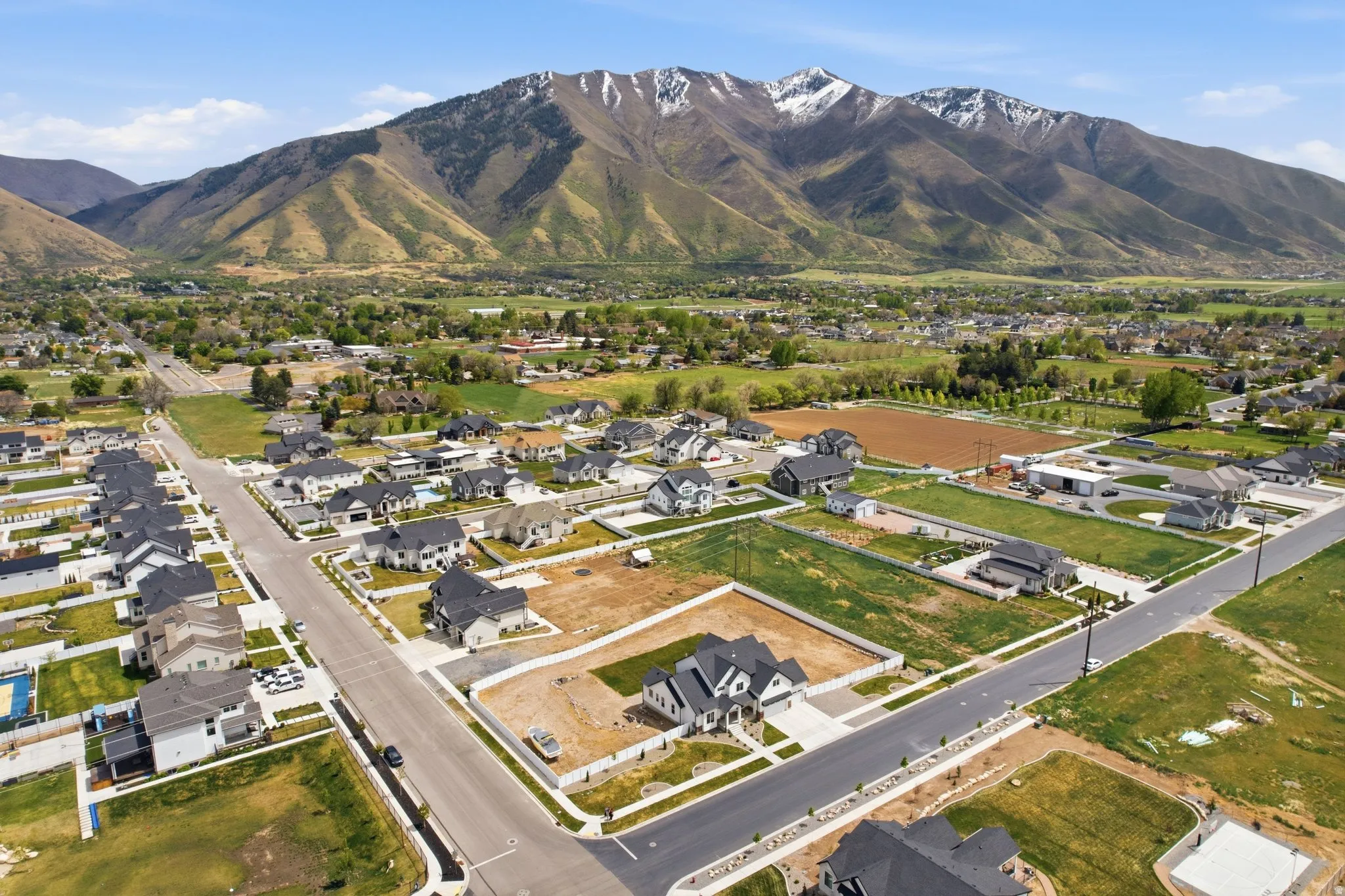 Aerial perspective of suburban area featuring mountains