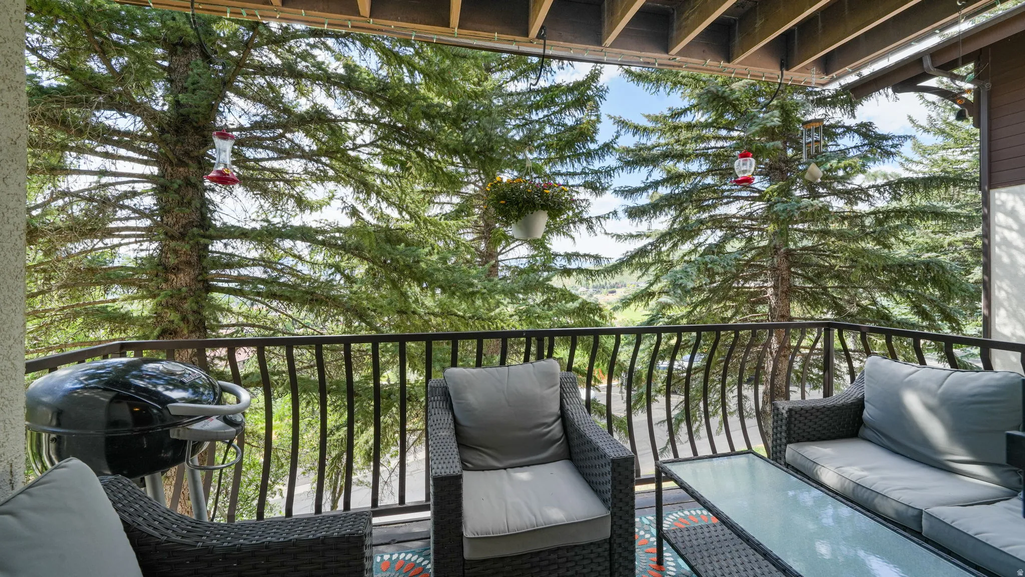 Balcony with a grill and an outdoor living space