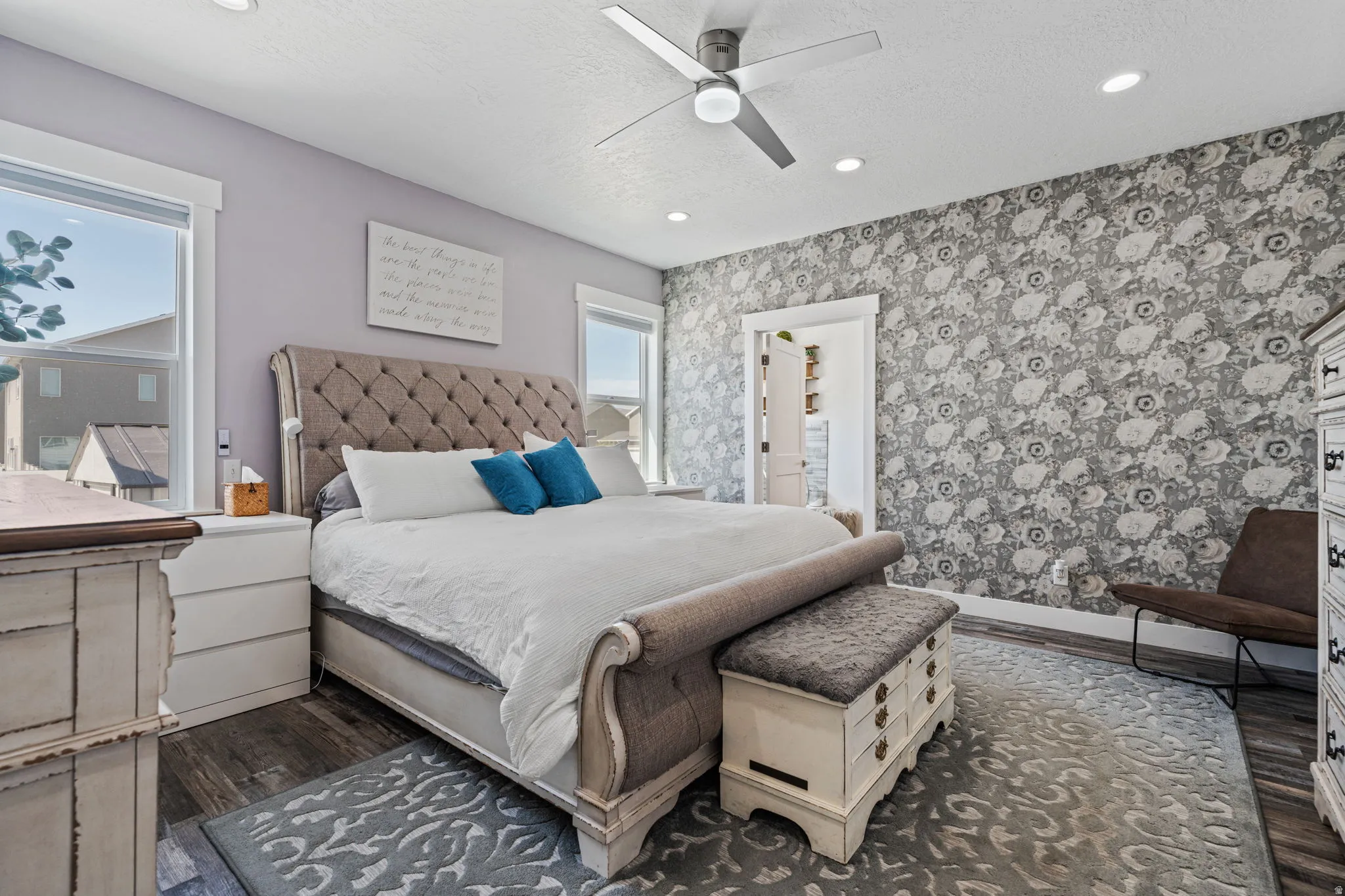 Bedroom with recessed lighting, dark wood finished floors, ceiling fan, and a textured ceiling