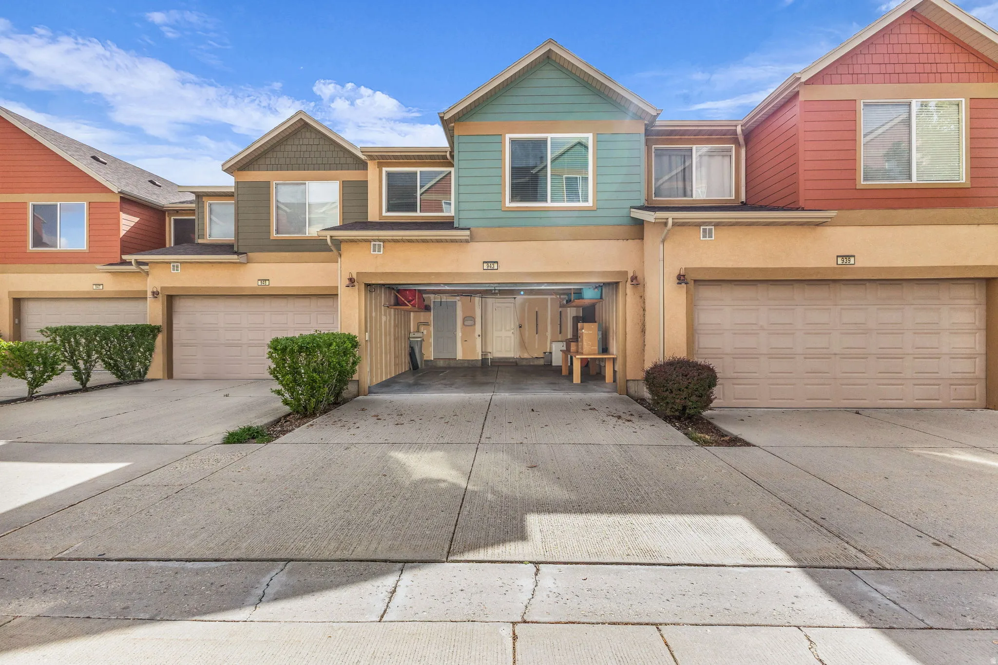 View of front of home featuring driveway and an attached garage