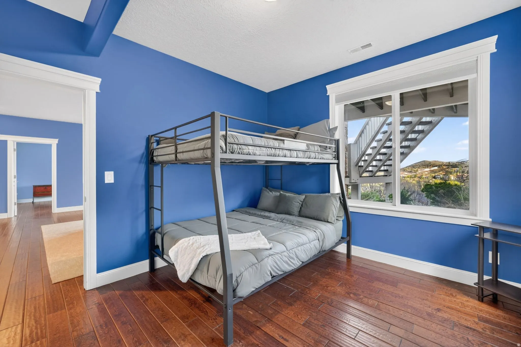 Bedroom featuring dark wood finished floors