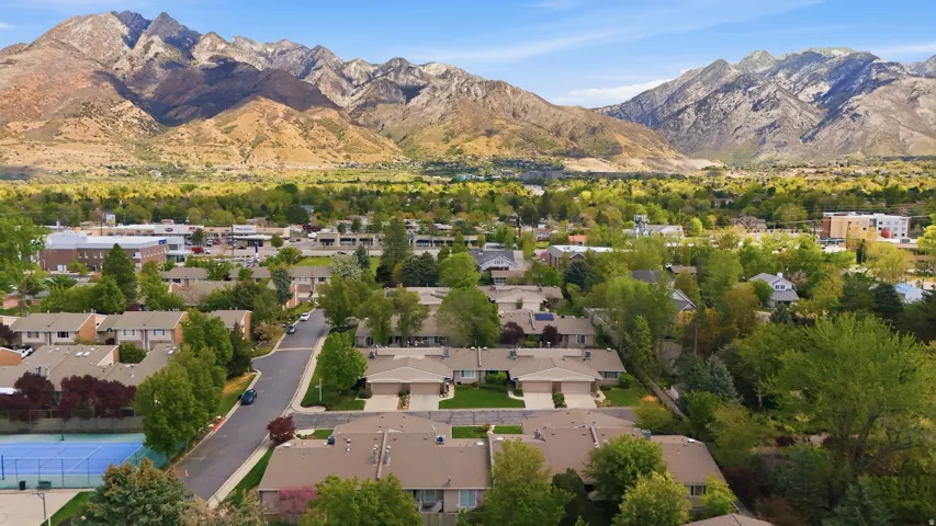 Aerial view of residential area with a mountainous background