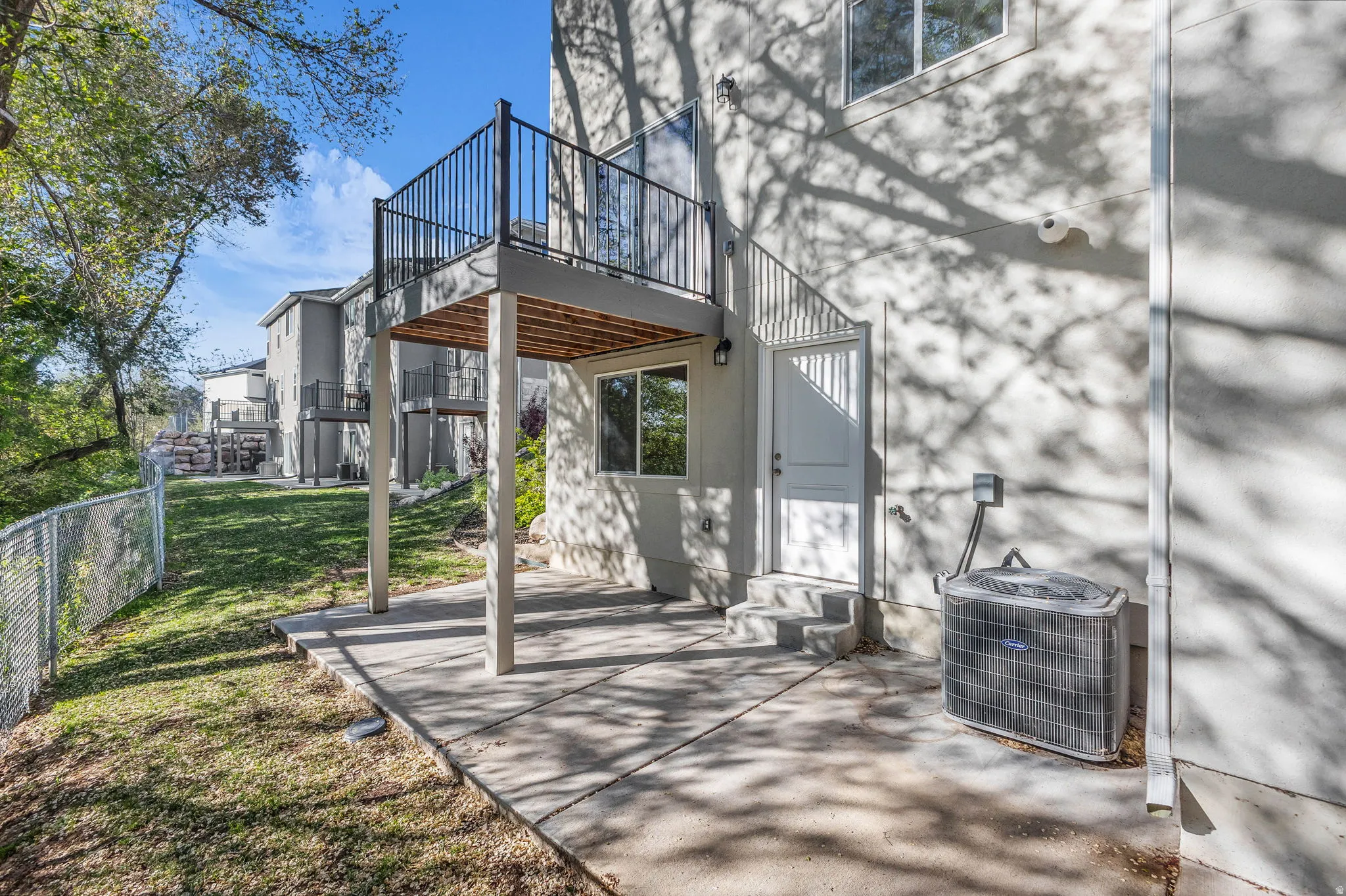 View of patio / terrace with a wooden deck and entry steps