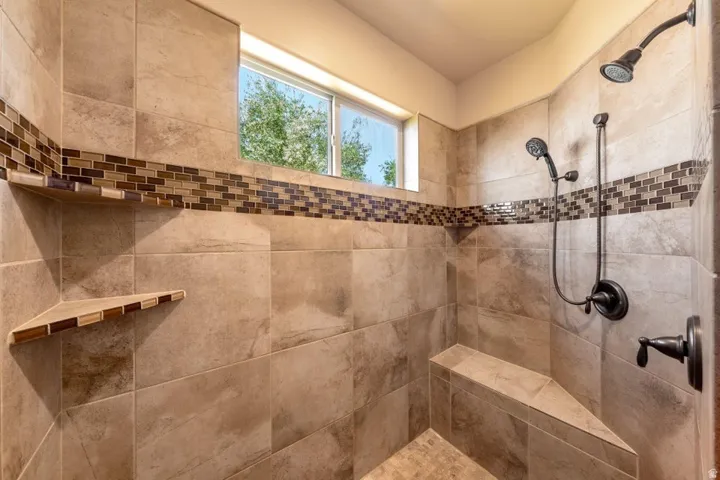 Bathroom with a tile shower