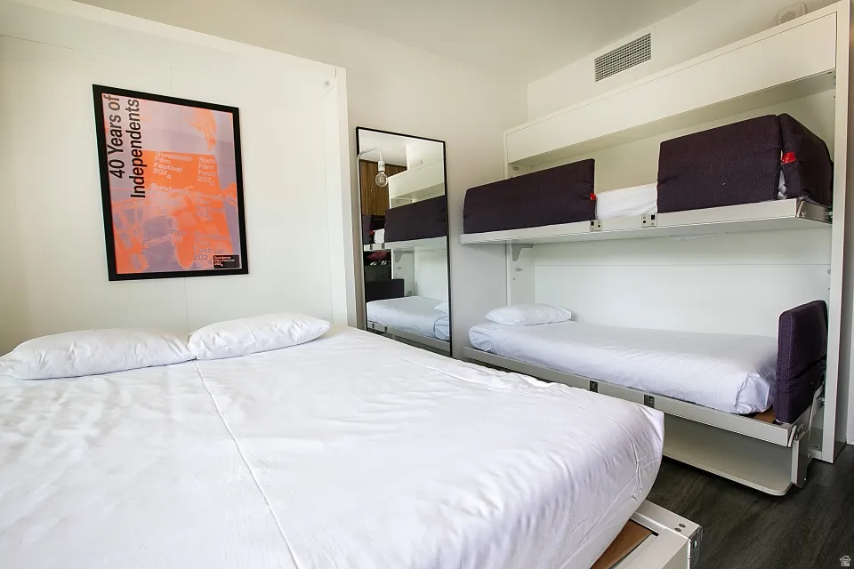 Bedroom featuring dark wood-type flooring