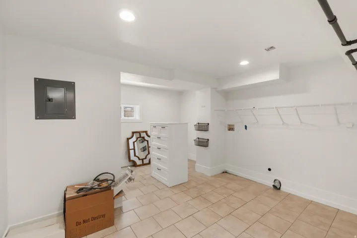 Huge laundry room usable for the upstairs