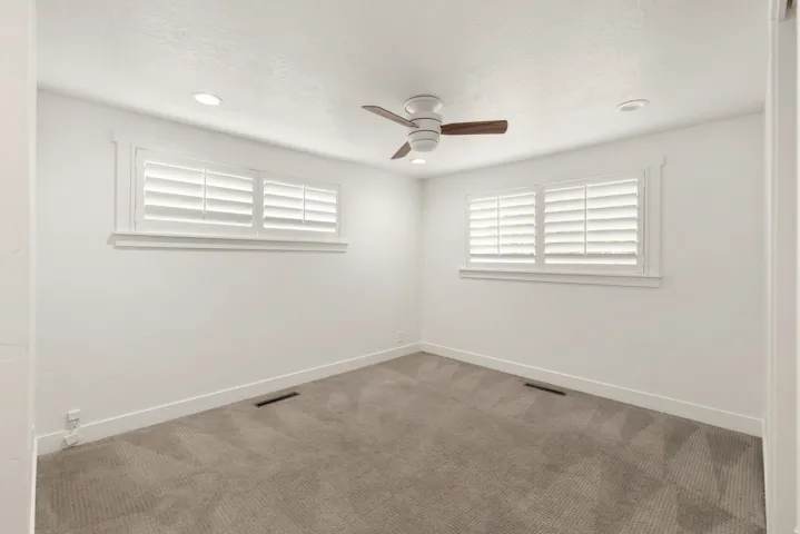 Fresh paint, ceiling fans, plantation shutters