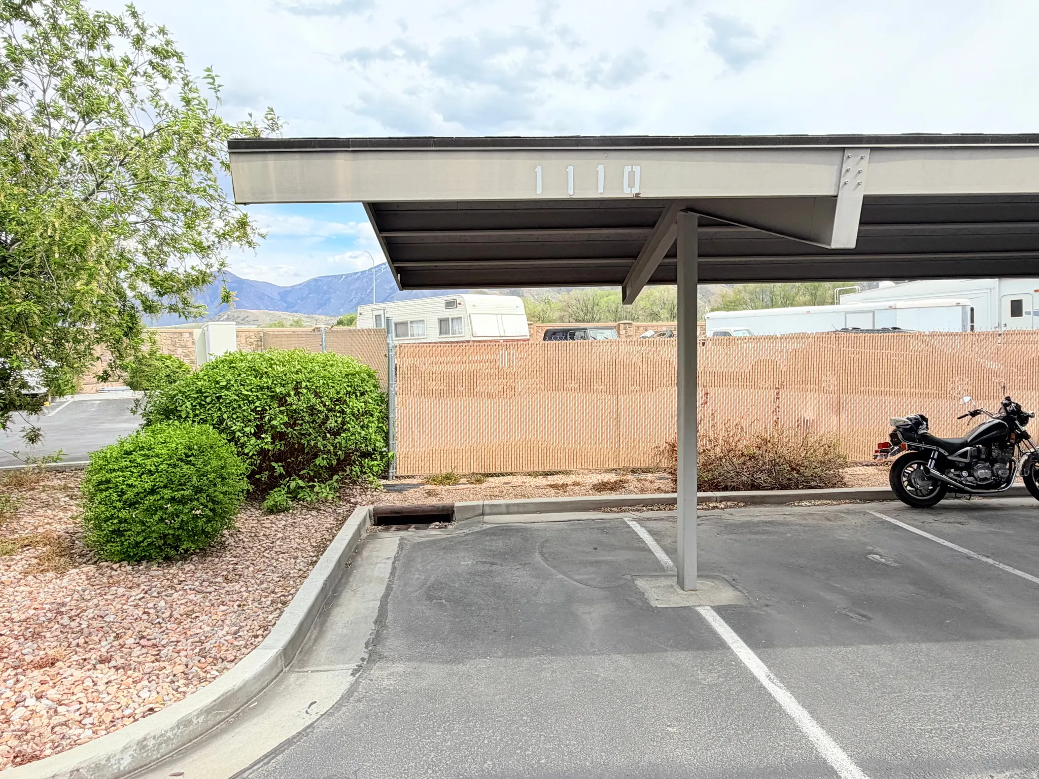 Covered parking lot with a mountain view