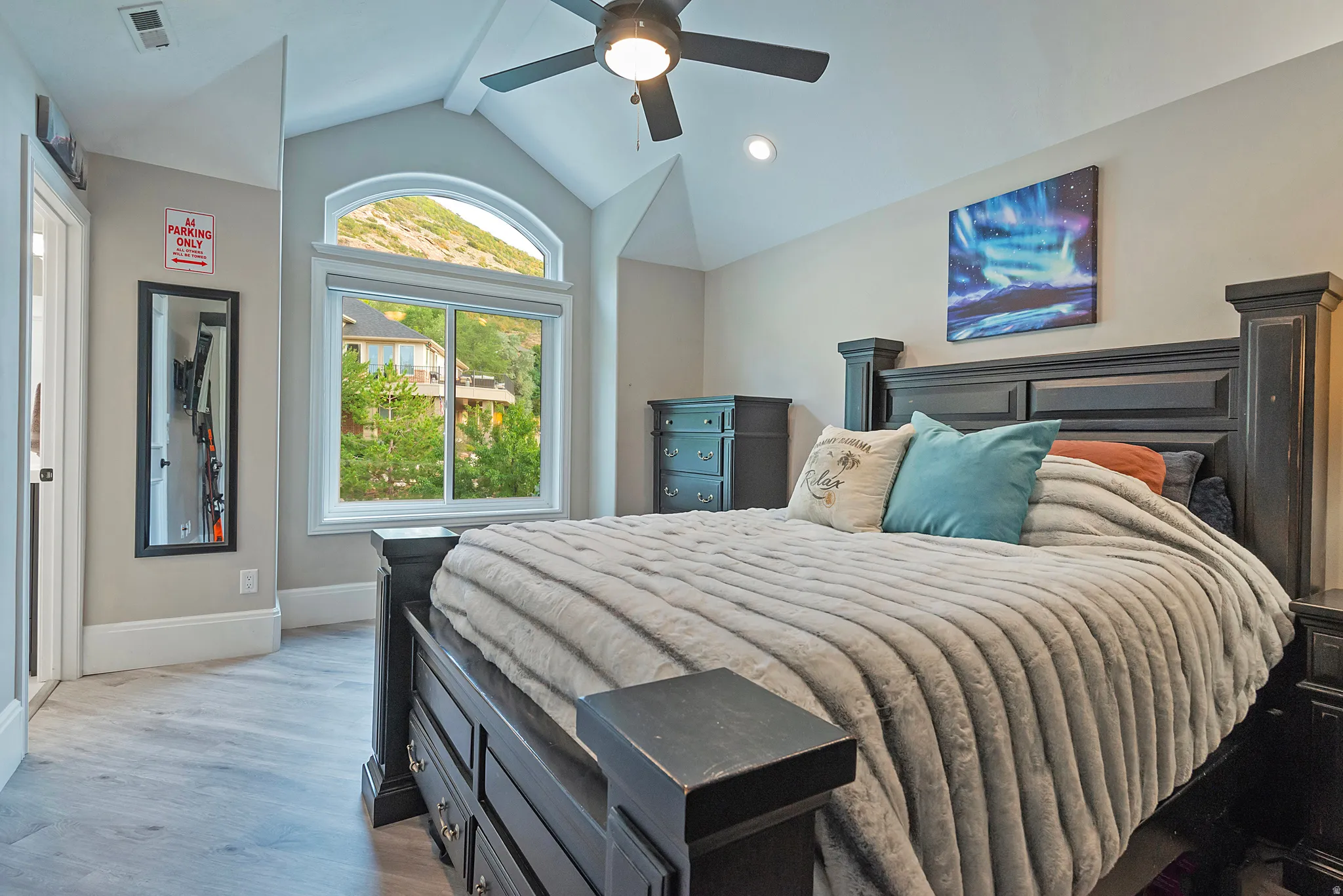 Bedroom featuring wood finished floors, ceiling fan, and recessed lighting