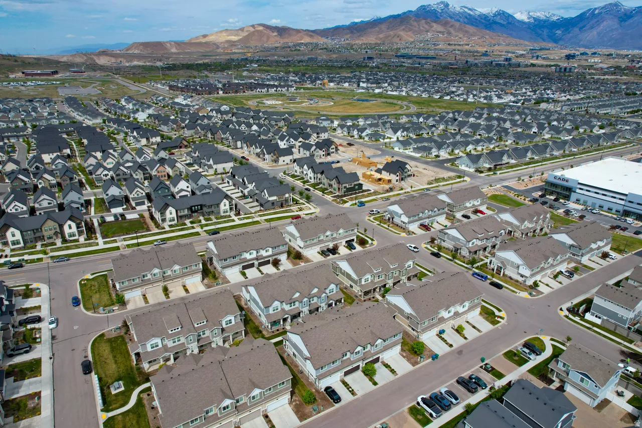 Aerial perspective of suburban area featuring mountains