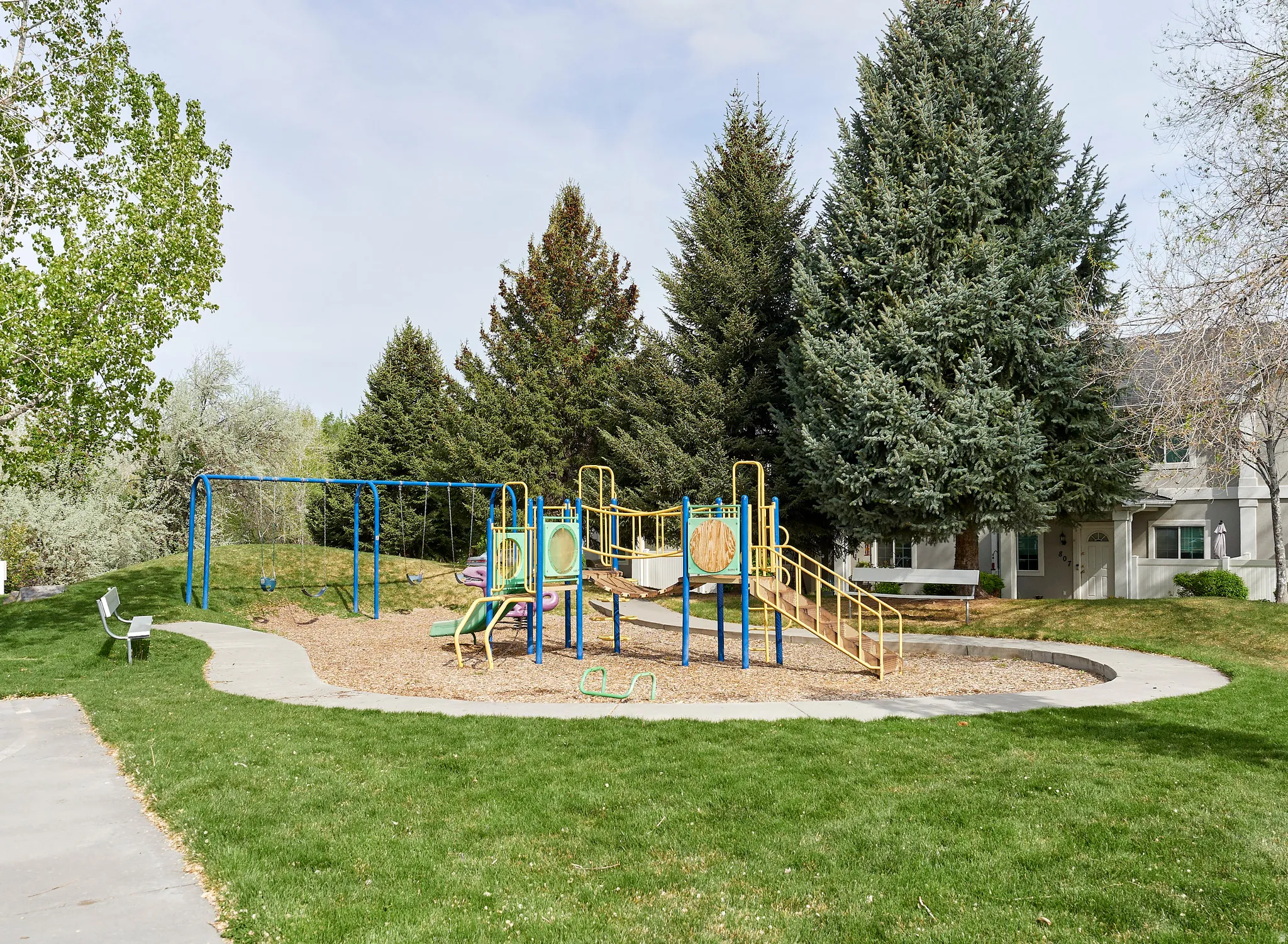 Communal playground with a lawn