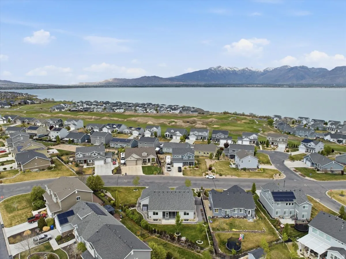 Aerial view of residential area with a water and mountain view