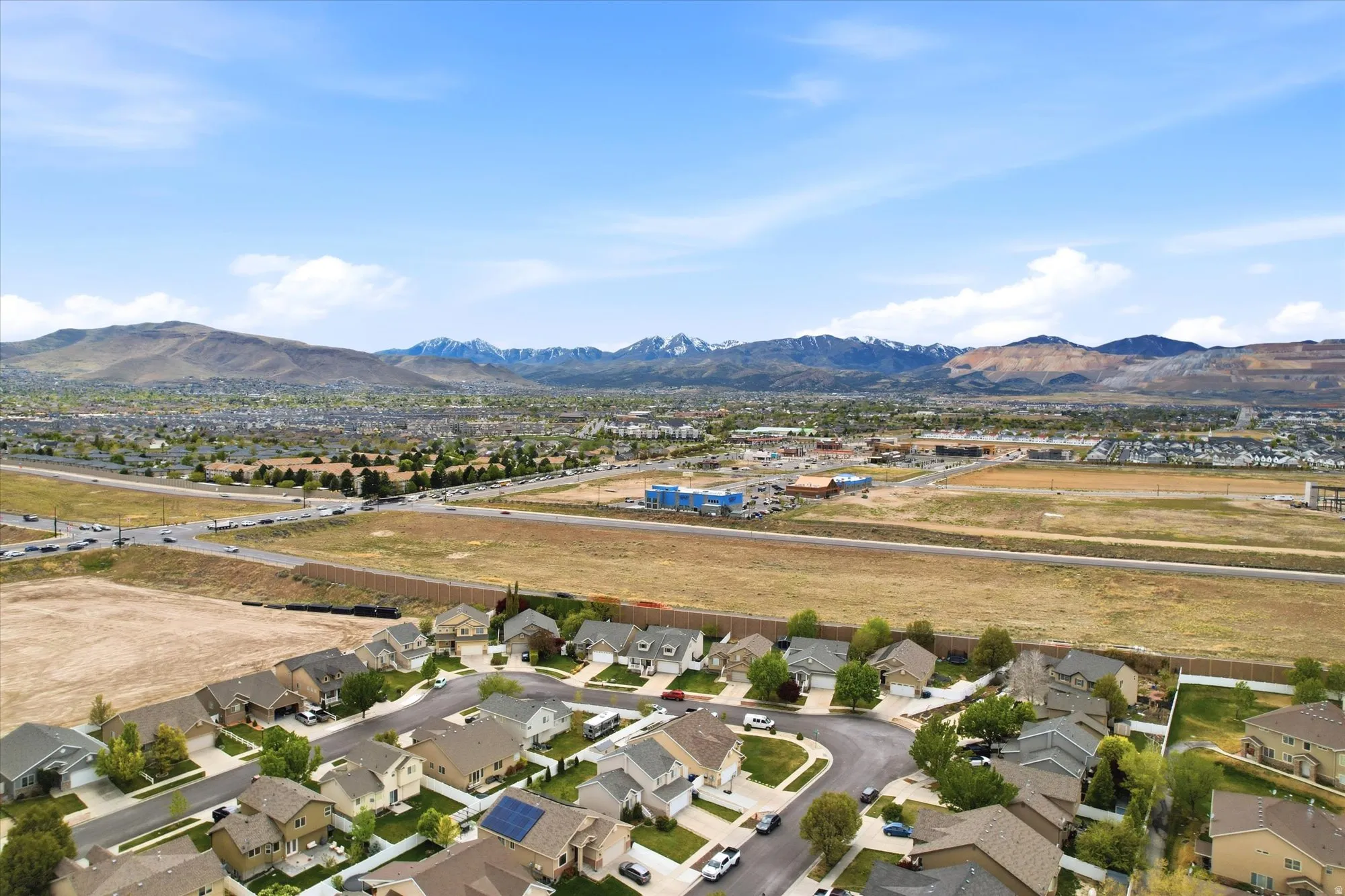 Aerial perspective of suburban area with mountains