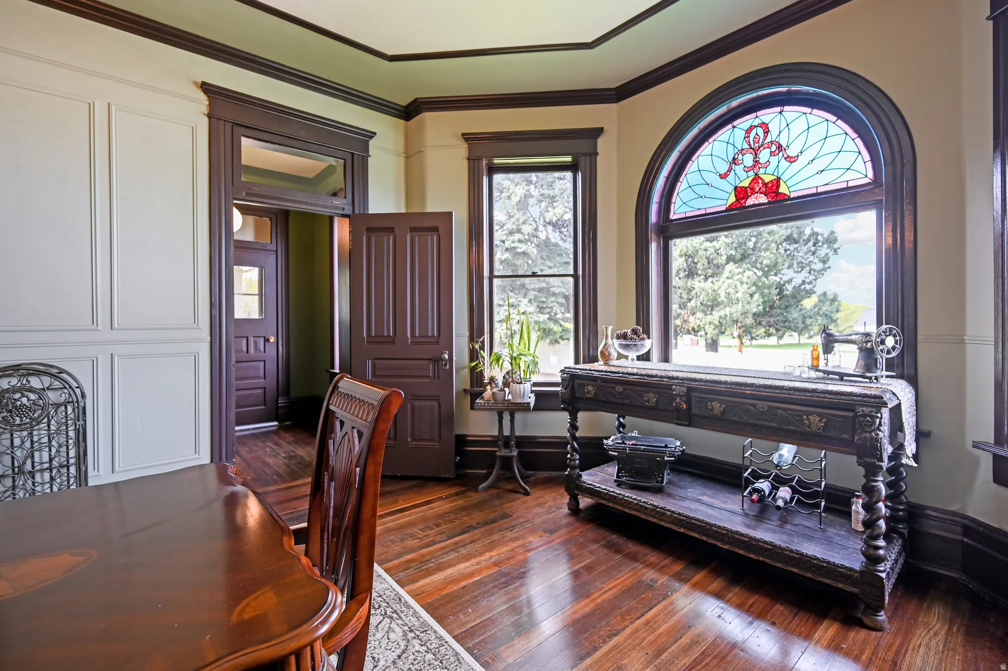 Bay window with stained glass in formal dining area