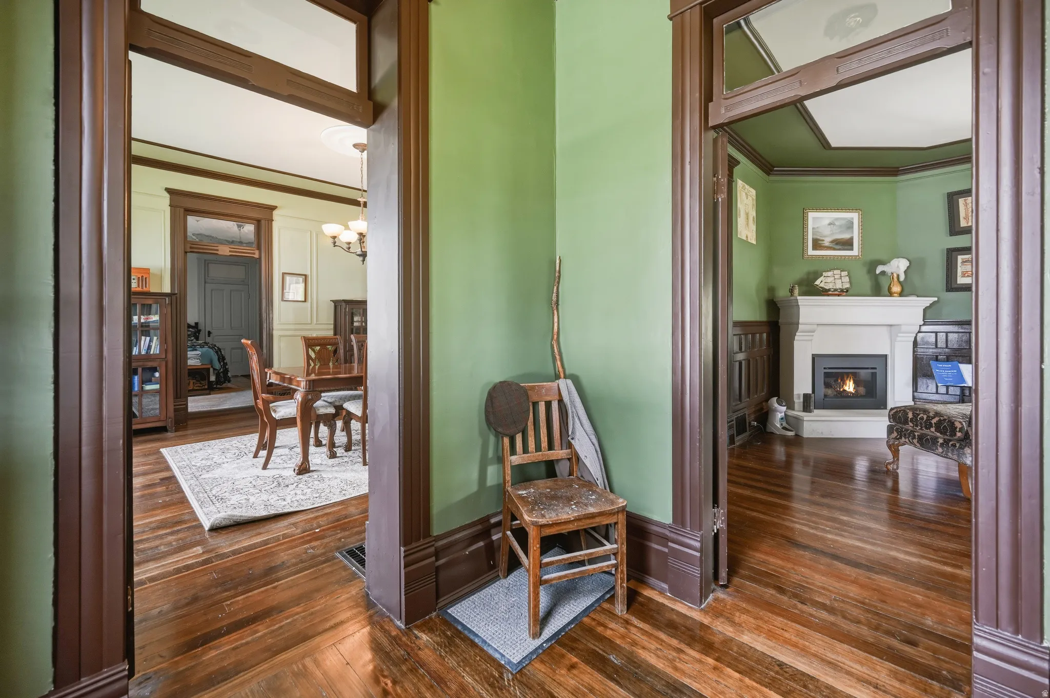 Formal entryway with entrance into formal dining room & library
