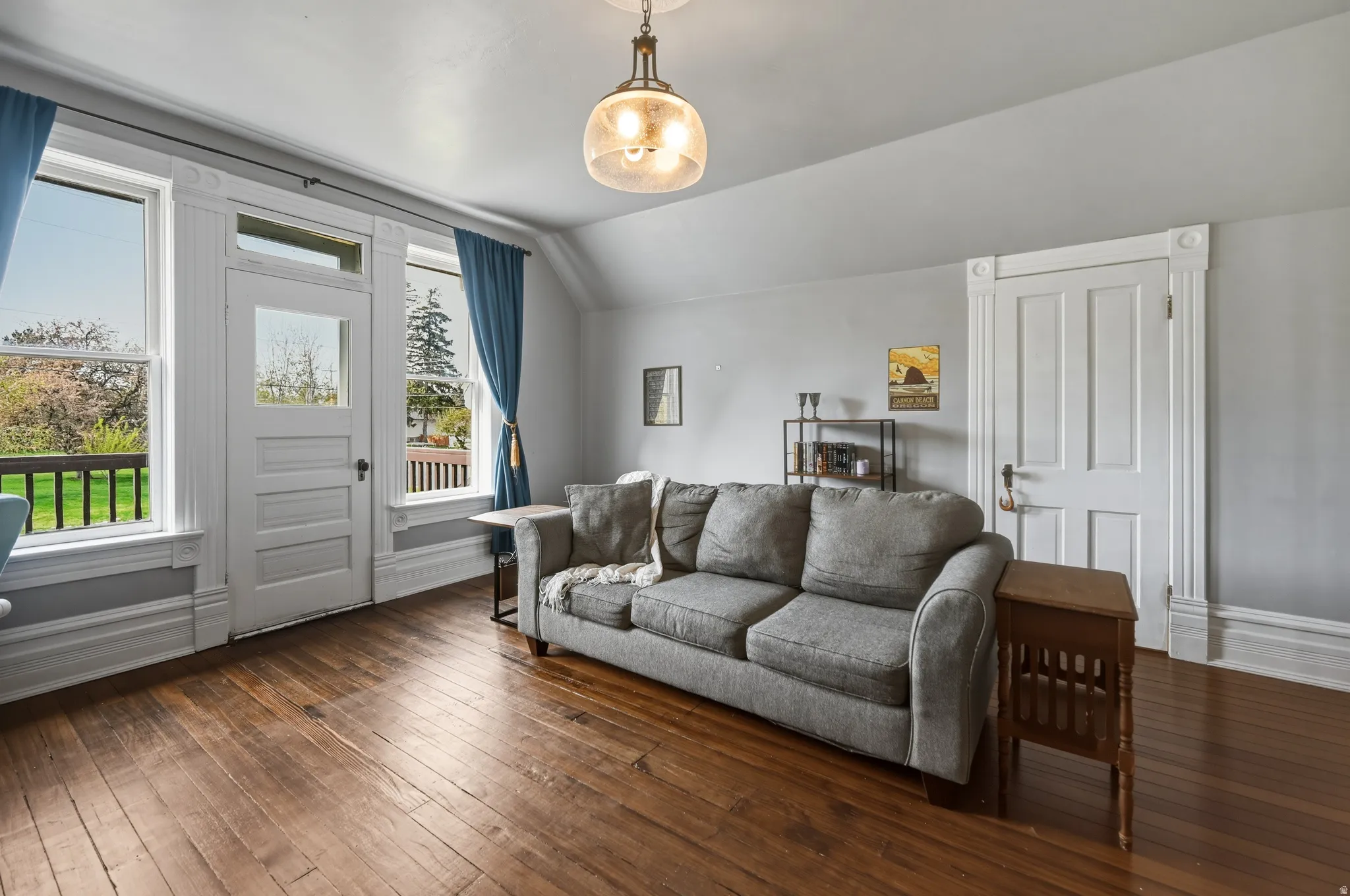 Upstairs family room/bedroom with entrance to front, upstairs balcony