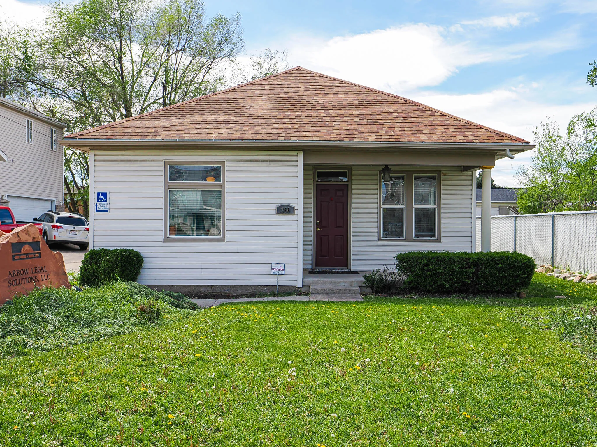 View of front of house with roof with shingles