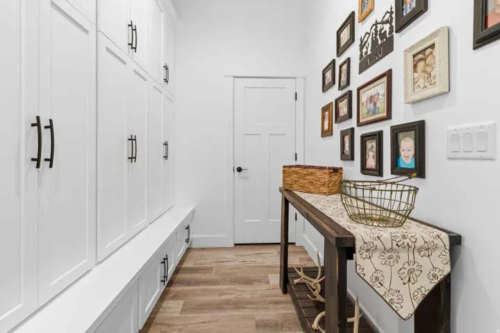 Mudroom featuring light wood-style flooring
