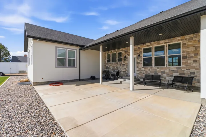 Rear view of home and patio