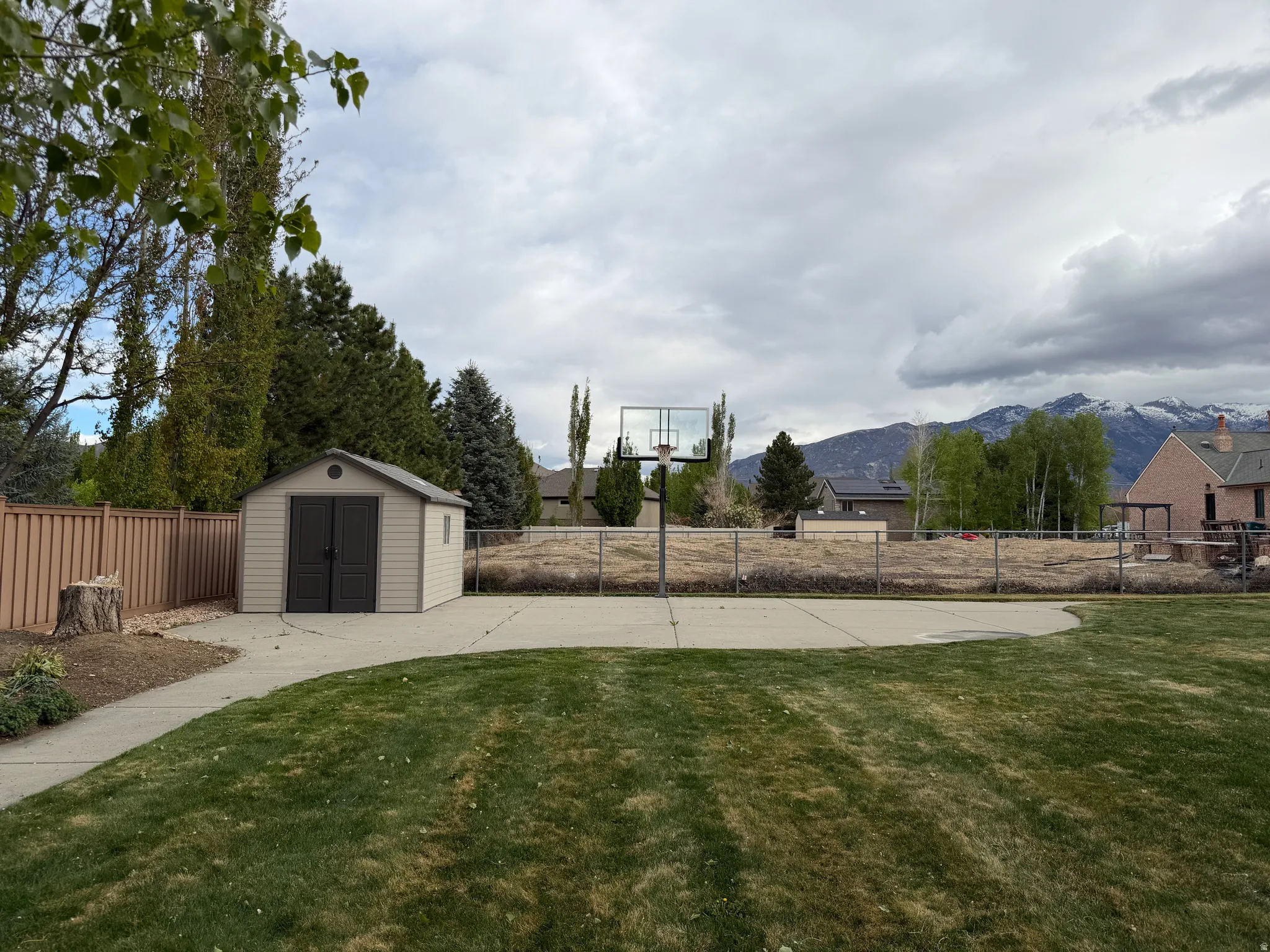 storage shed, sport court and mountain views