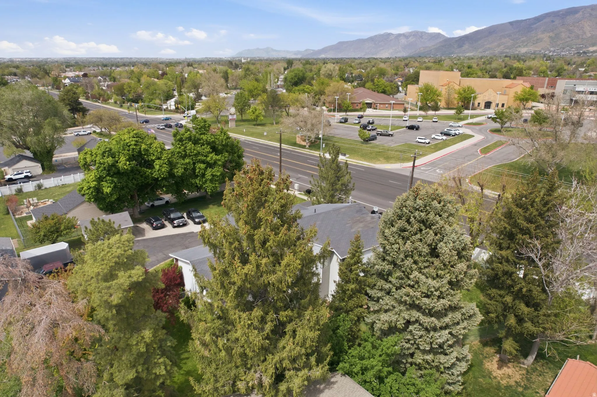 Aerial view of residential area with a mountainous background