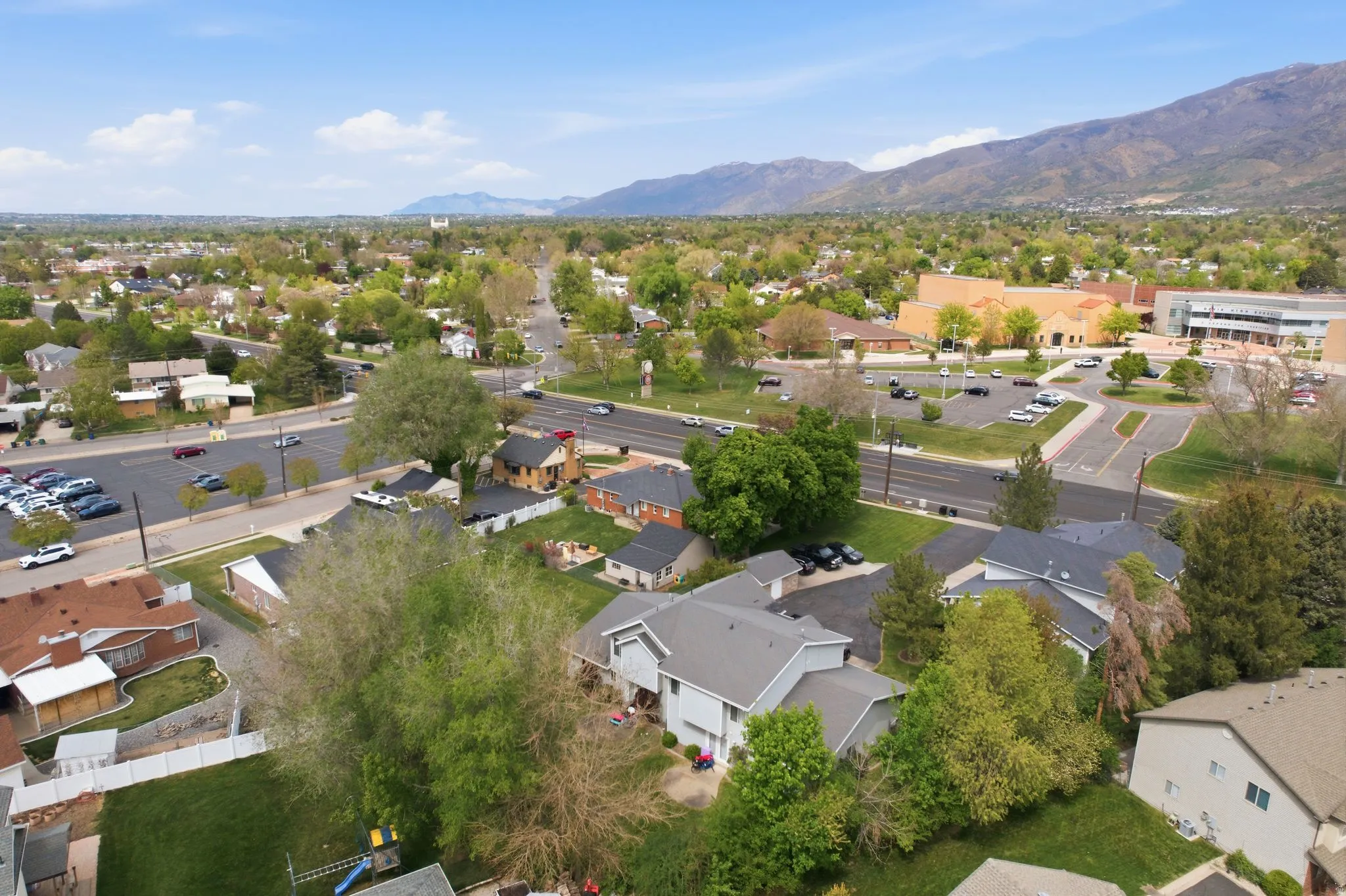 Aerial view of residential area with a mountain backdrop