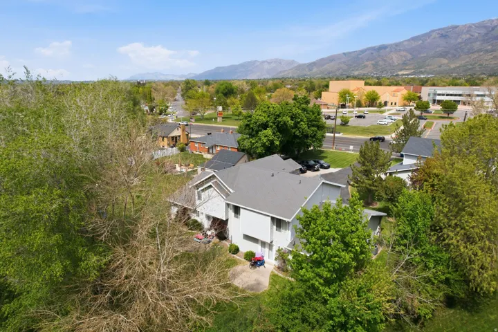 Aerial view of residential area featuring mountains