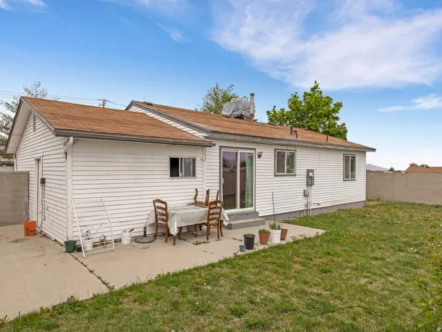 Rear view of house with a patio area