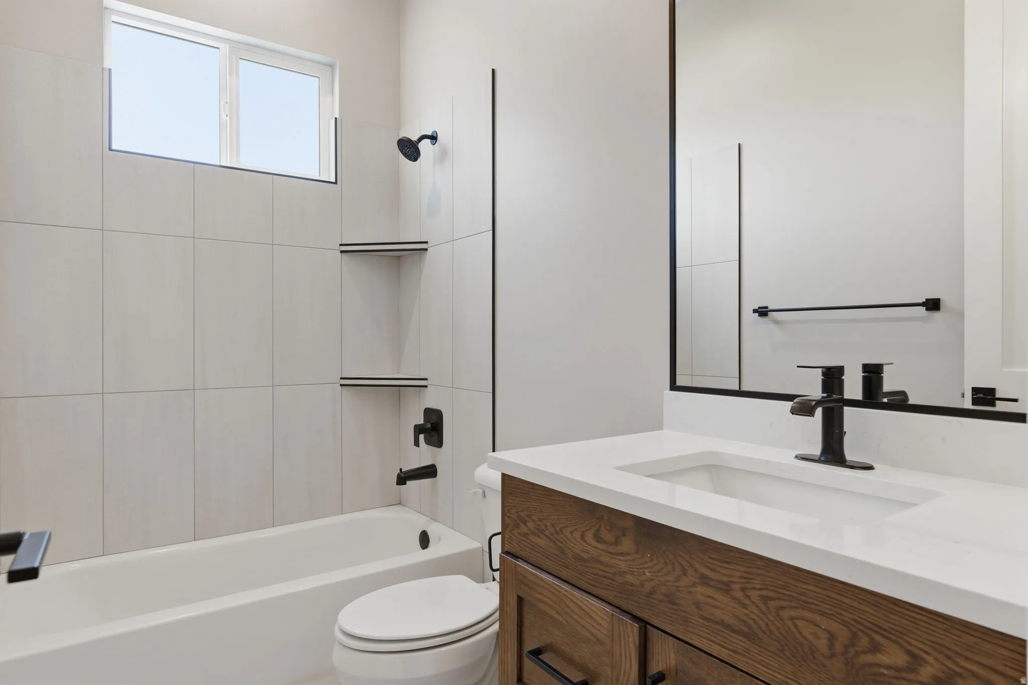 Full bathroom with vanity and shower / bathtub combination