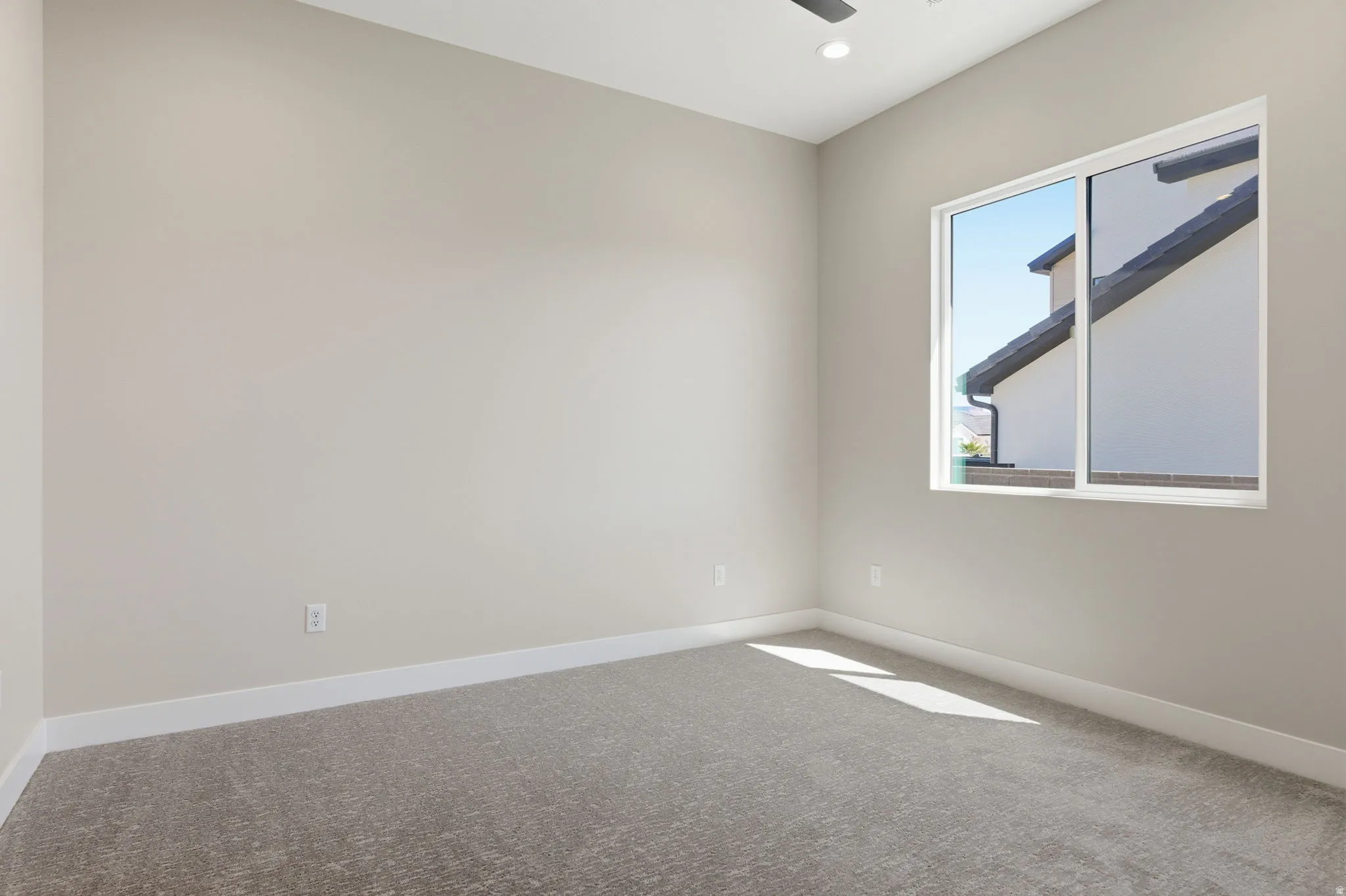 Unfurnished room featuring carpet floors and recessed lighting