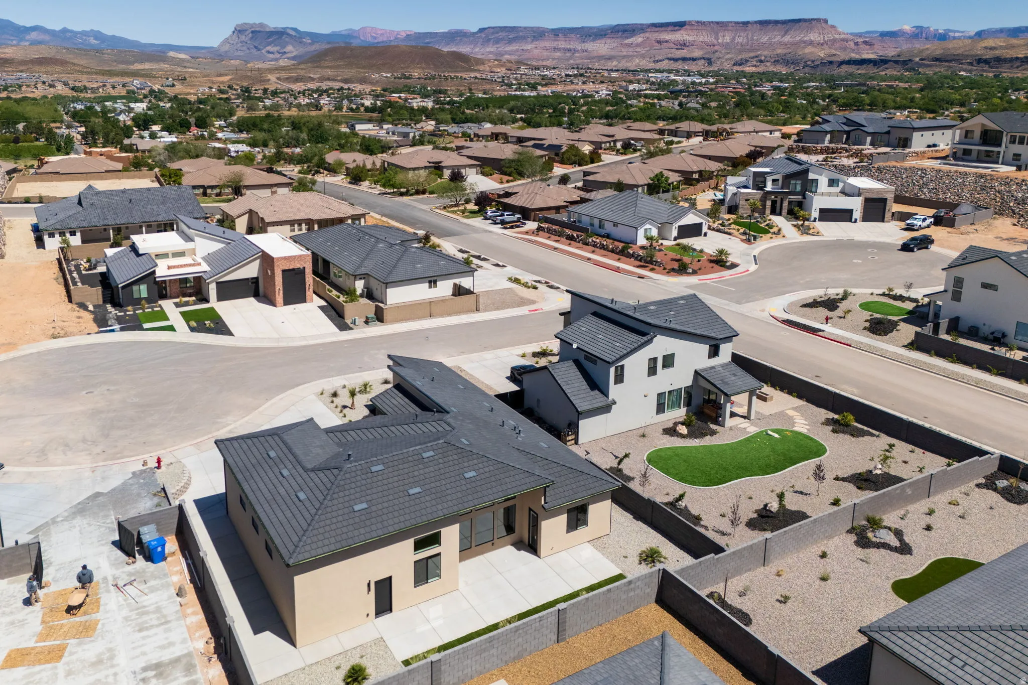 Aerial perspective of suburban area with mountains