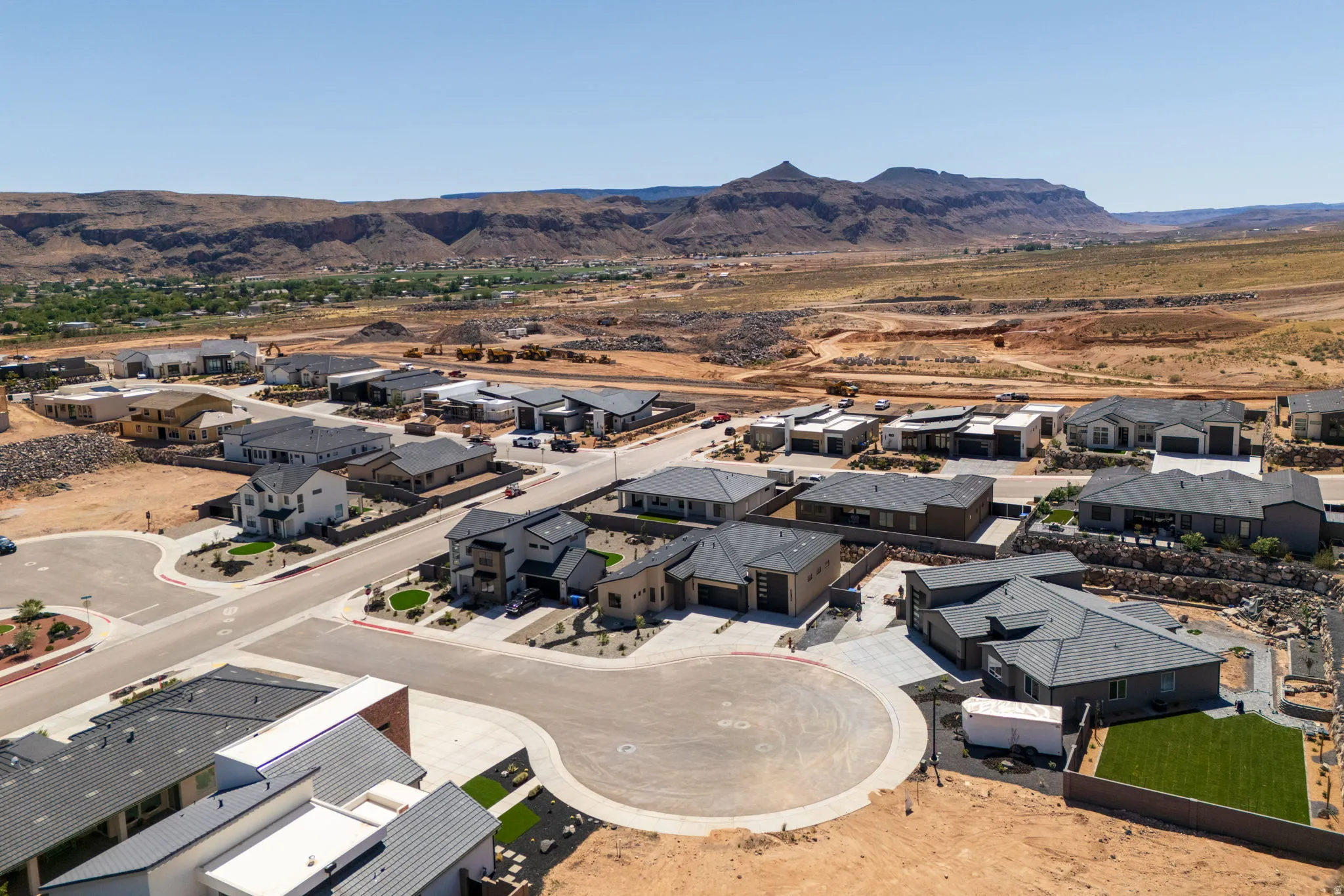 Aerial view of residential area with a mountainous background